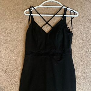 Tight strappy black dress